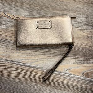 Rose gold Kate Spade wallet wristlet